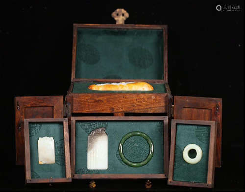 FIVE CHINESE JADE CRAVINGS IN HUANGHUALI TREASURE CASE