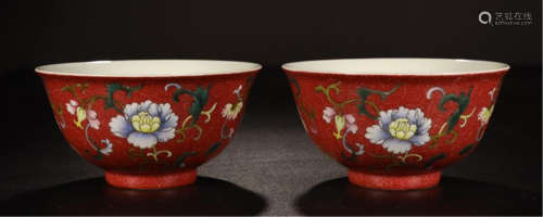 PAIR OF CHINESE PORCELAIN RED GLAZE FAMILLE ROSE FLOWER BOWLS