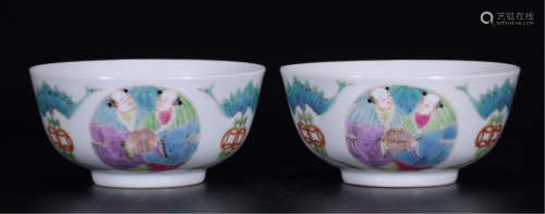 PAIR OF CHINESE PORCELAIN FAMILLE ROSE BOY PLAYING BOWLS