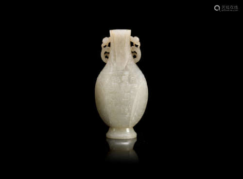 18th/19th century and 19th century A small grey jade archaistic vase and a pair of spinach green figures