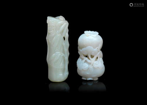 19th/20th century A pale jade carving of pomegranate and a pale green jade carving of bamboo