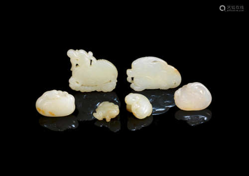 Qing Dynasty and later A group of six white and pale green jade animal carvings