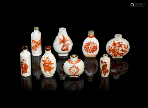 19th/20th century A group of eight iron red enamelled porcelain snuff bottles