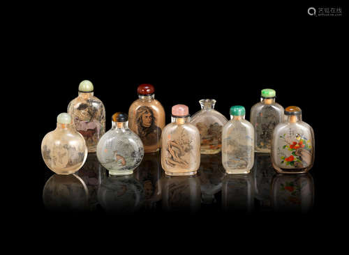 20th century A group of nine glass and rock crystal inside-painted snuff bottles