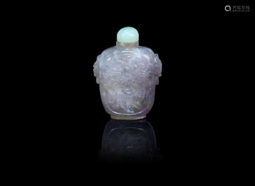 1850-1900 A carved lavender quartz snuff bottle