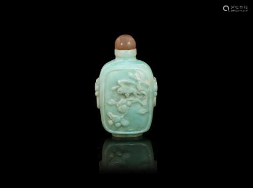 1850-1900 A carved jadeite 'bird and flower' snuff bottle