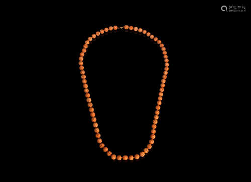 19th century A carved coral part-court necklace, chaozhu