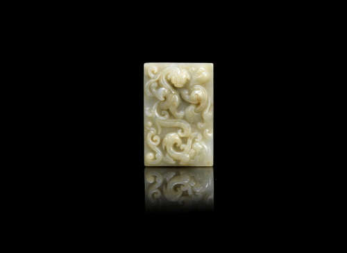 Yuan Dynasty or later A green jade 'dragon and phoenix' pendant