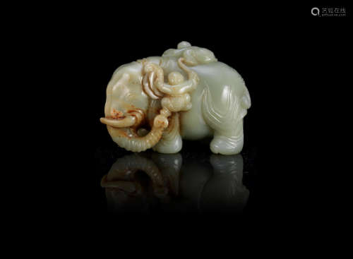 Qing Dynasty A large pale green and russet jade elephant group
