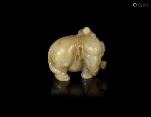 Qing Dynasty A green and russet jade elephant group