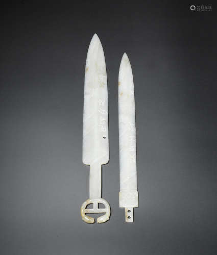 Two archaistic white jade ceremonial swords