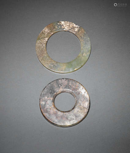 Warring States/Han Dynasty A jade disc, bi and a jade ring, huan