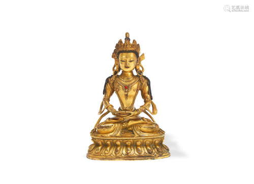 A Sino-Tibetan gilt bronze figure of Amitayus