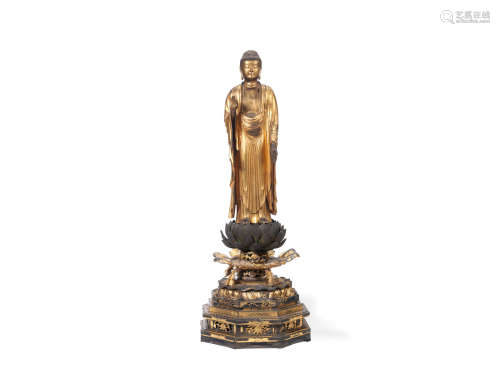 Japan, Edo Period A large sectional gilt and lacquered wood figure of Buddha