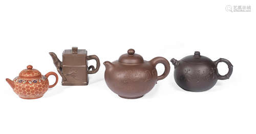 Qing Dynasty  A group of four Yixing teapots and covers