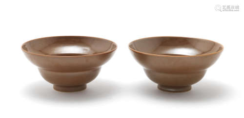 Qianlong seal marks and of the period A pair of Café-au-lait glazed ogee-form bowls