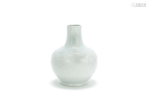 18th century A pale celadon glazed 'dragon' bottle vase