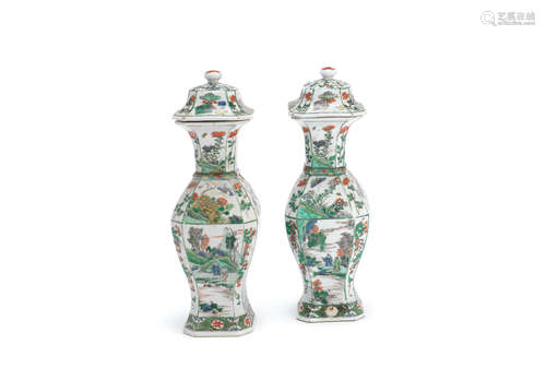 Kangxi A pair of famille verte square-section baluster vases and covers