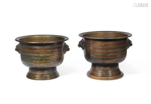 Probably 19th century A pair of circular bronze jardinières