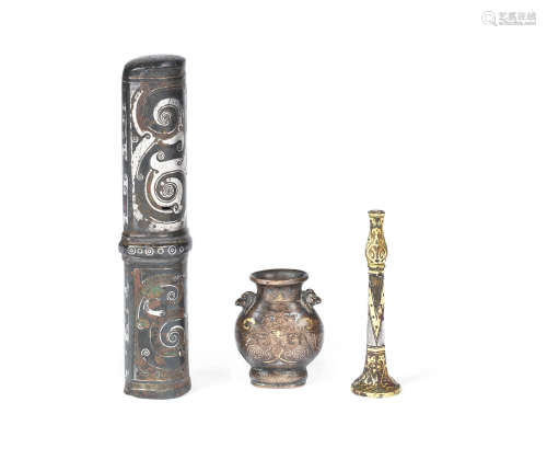 Warring States and later  Two silver and gold inlaid bronze fittings and a miniature vase