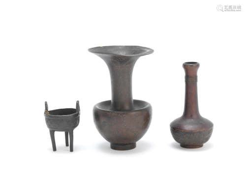 Ming Dynasty and later Two bronze vases and a small tripod incense burner, ding