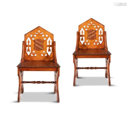 A PAIR OF 19TH CENTURY OAK HALL CHAIRS, the pointe…