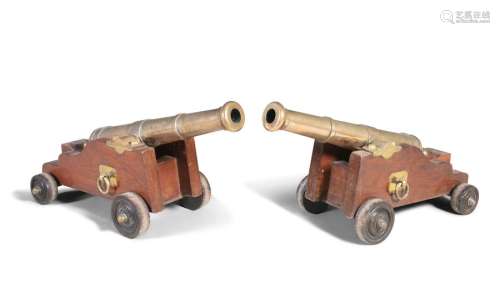 A PAIR OF 18TH/19TH CENTURY BRASS CANNONS, each wi…