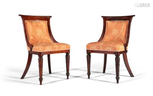 A PAIR OF WILLIAM IV ROSEWOOD FRAMED LIBRARY CHAIR…
