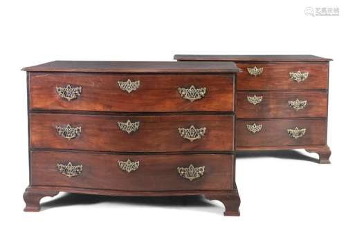 A PAIR OF GEORGE III MAHOGANY SERPENTINE CHESTS, w…