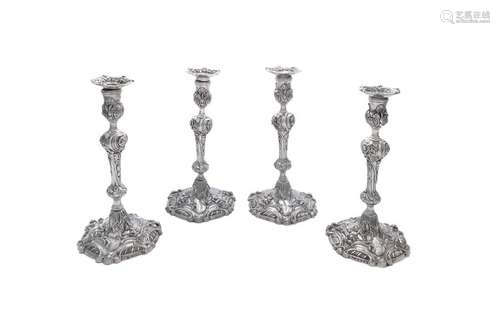 A SET OF FOUR IRISH SILVER CANDLESTICK, three c.17…