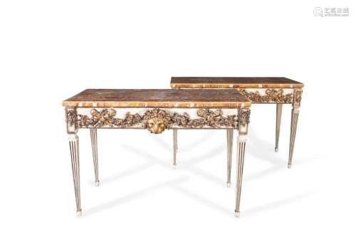 A PAIR OF REGENCY PAINTED AND GILDED TIMBER CONSOL…