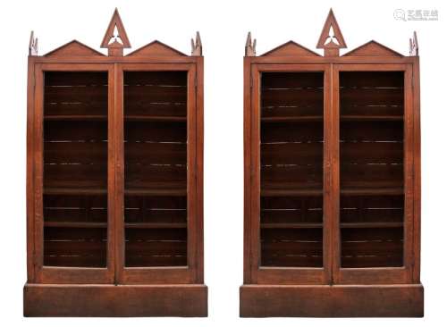 A PAIR OF IRISH VICTORIAN GOTHIC LOFTY OAK BOOKCAS…