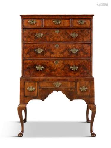 A GEORGE II WALNUT CHEST ON STAND, the upper secti…