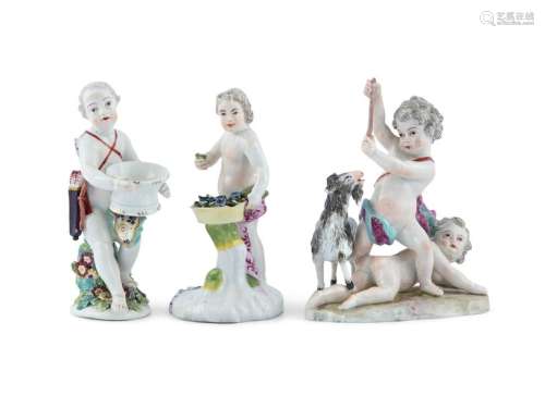 A MEISSEN STYLE GROUP OF TWO PUTTI PLAYING WITH A …
