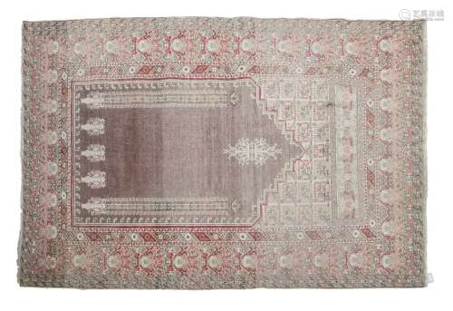 A 19TH CENTURY SILK PRAYER RUG, the central field …