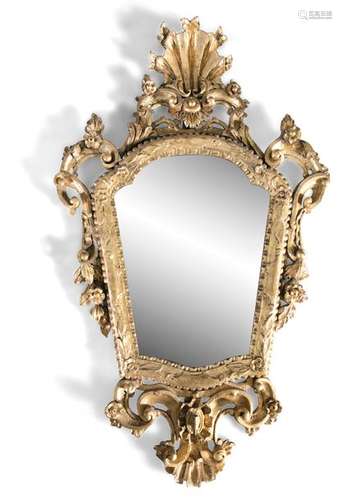 A GEORGE III GILTWOOD GIRONDOLE WALL MIRROR, in th…