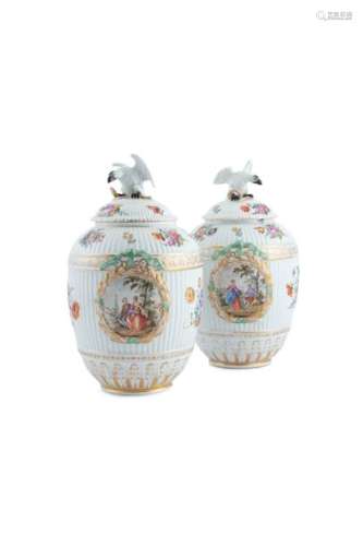 A PAIR OF LARGE BERLIN PORCELAIN URNS AND COVERS, …
