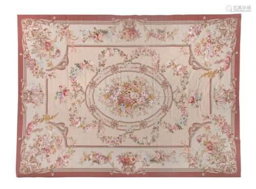A LARGE AUBUSSON TAPESTRY CARPET, of classical des…