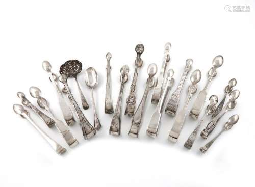 A collection of silver sugar tongs, comprising: a …