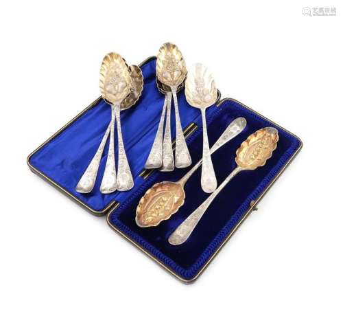 A collection of silver berry table spoons, includi…