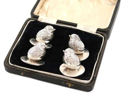 A set of four Edwardian novelty silver chick menu …