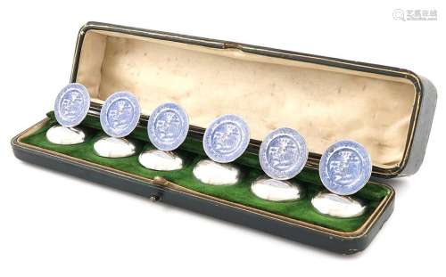 A set of six silver and enamel menu card holders, …