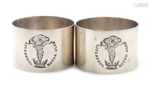 A pair of silver napkin rings, by Elkington and Co…