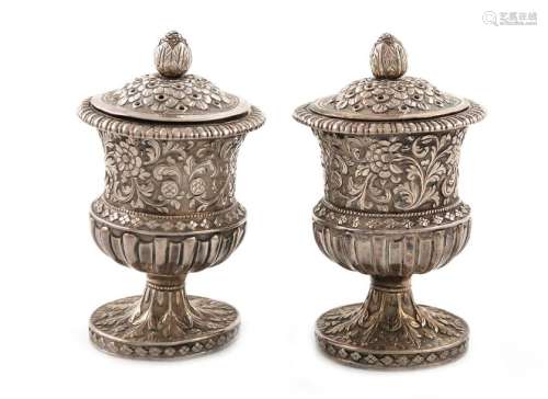 A pair of late 19th century Indian silver pepper p…