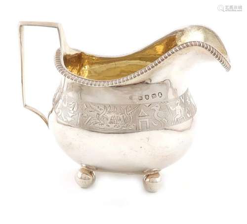 A George III silver cream jug, maker's mark partia…