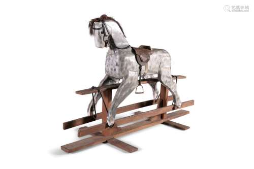 AN EARLY 20TH CENTURY FOLK ART ROCKING HORSE. 160c…