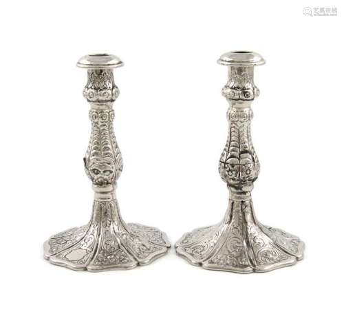 A pair of Victorian silver taper sticks, by Henry …