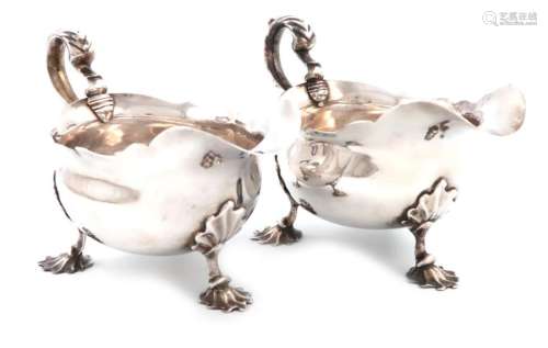 A matched pair of George II silver sauce boats, by…