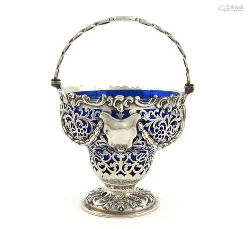 A Victorian silver swing handled sugar basket, by …