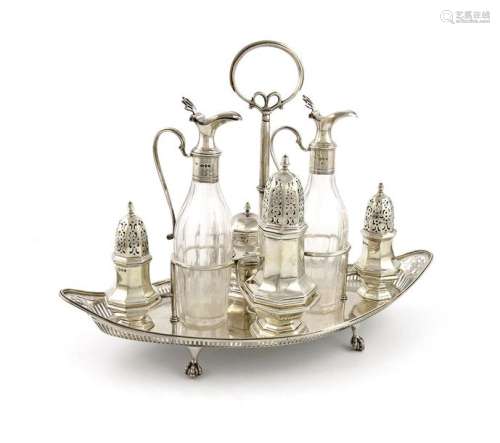 A Victorian silver cruet frame, by Gibson and Lang…